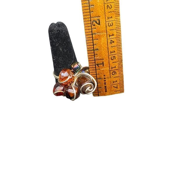 Lot of four rings two stretchy and two silver tone wire brown enamel, silver flo - Picture 5 of 7